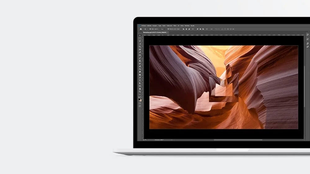 Laptop with Adobe Photoshop opened on the screen