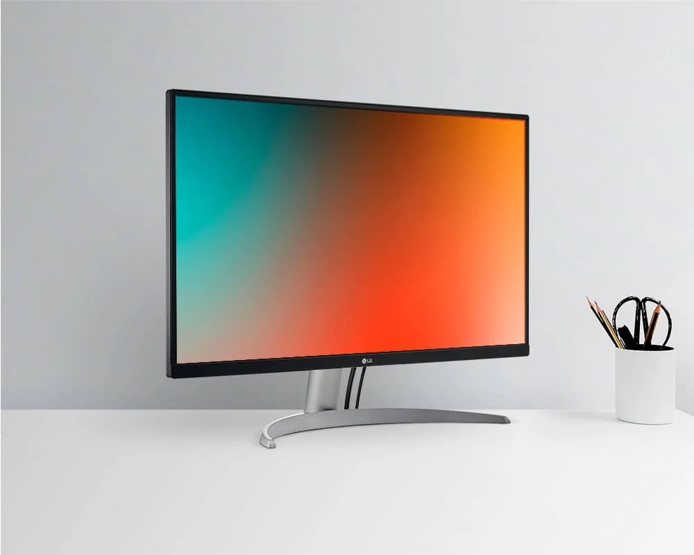 Front view of a 27" LG 27UP600-W monitor on a desktop, 