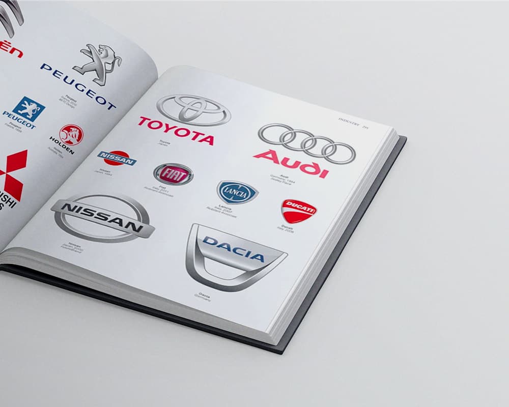 Close-up of the inside pages of the book "LOGO Design. Global Brands" by Julius Wiedemann.