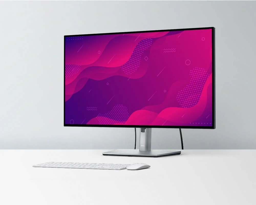 DELL UltraSharp U2723QE monitor on a desk