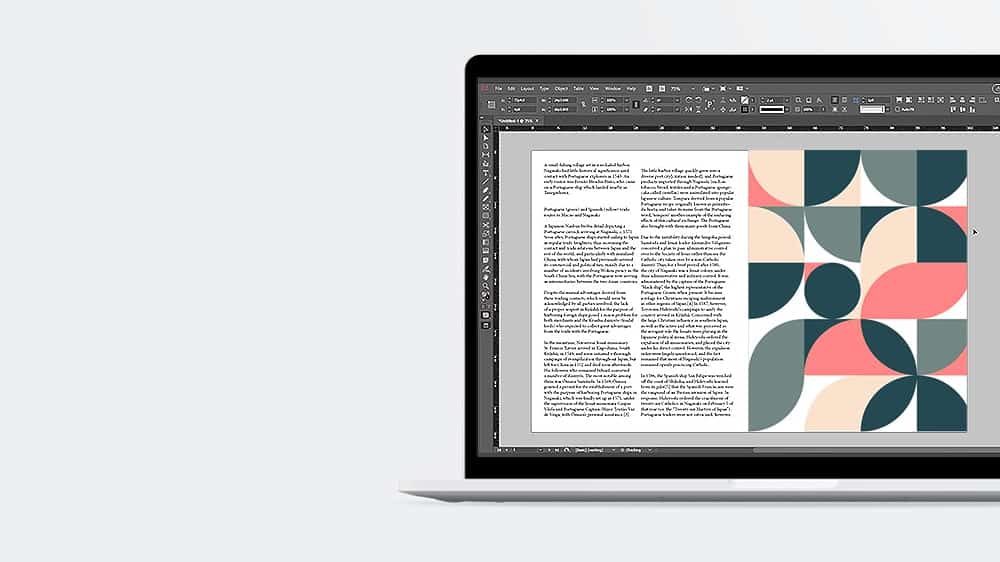Interfaz de Adobe InDesign, visto en un laptop