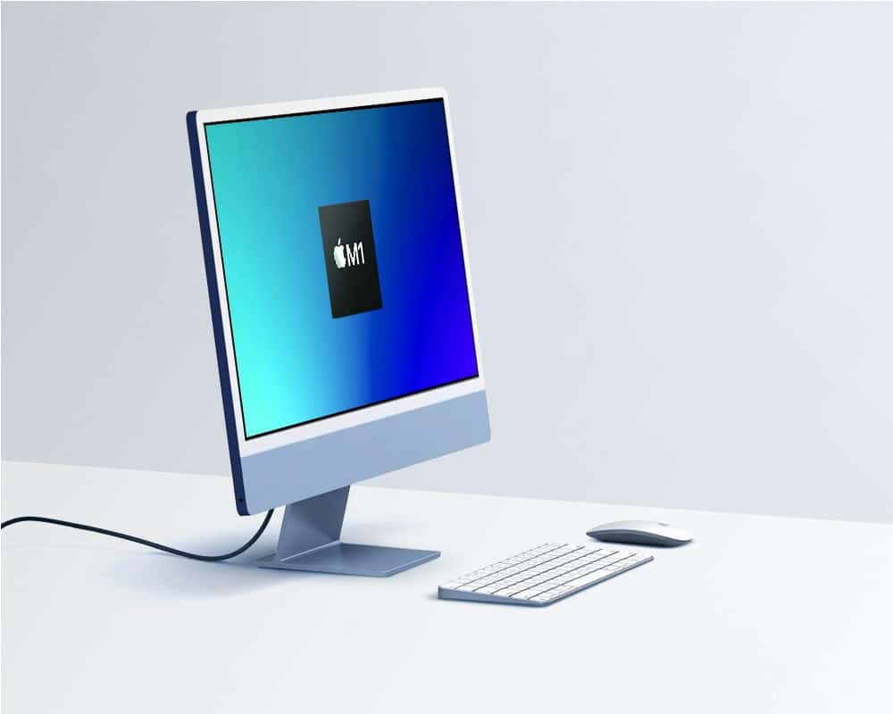 Apple iMac de 24" con chip M1, colocado sobre una mesa